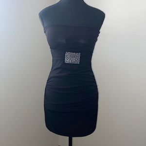 Black mini strapless tube top embellished dress with sheer detail.